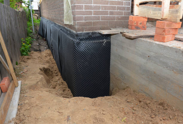 Happy homeowners after waterproofing job in South Milwaukee